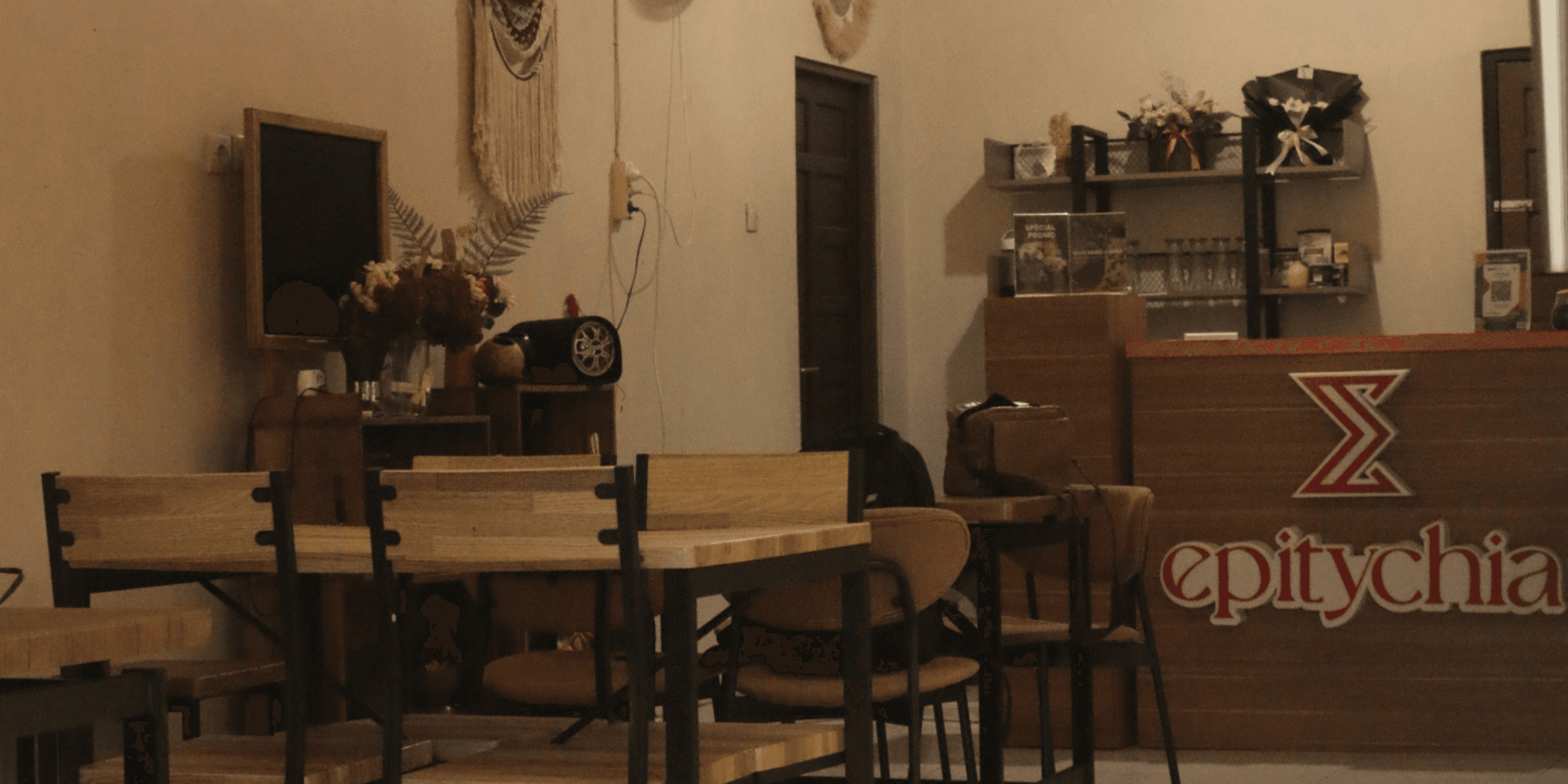 Warm and inviting cafe interior with sunlight streaming through the windows